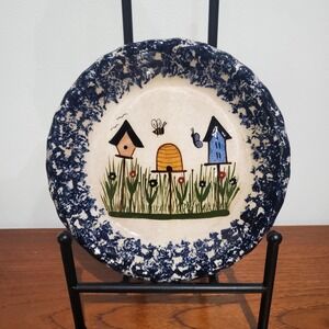 Spatterware pottery blue and white pie plate with birdhouse nature motif